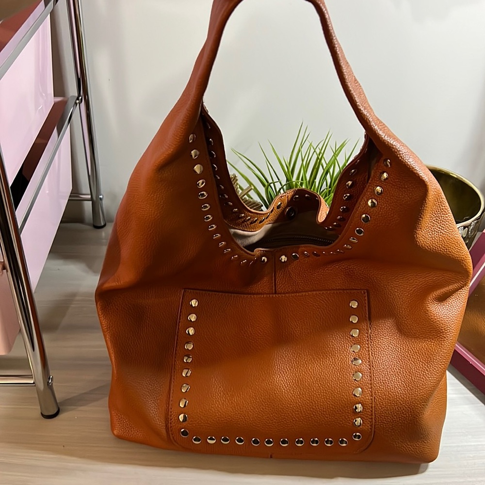 Butter leather purse with gold studs